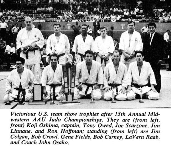 Victorious US team show tropies after 13th Annual Midwstern AAU Judo Championships. They are (from left, front) Koji Oshima, captain, Tony Owed, Joe Scarzone, Jim Linnane, and Ron Hoffman; standing (from left) are Jim Golgan, Bob Crowl, Gene Fields, Bob Carney, Lavern Raab, and Coach John Osako.