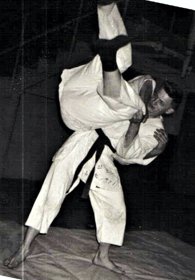 John playing judo in his thirties when he earned Shodan