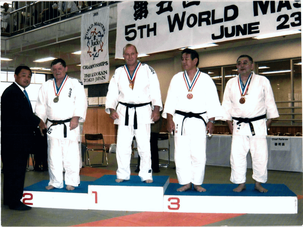 Japanese Judo great, Yasuhiro Yamashita, congratulates John Bassano, Sr. for earning a silver medal at the Fifth World Masters Judo Championship in 2003.