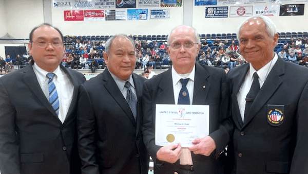 (Left to right) Rome Acopan. Pres of Intermountain YDK, Mitchell Palacio, Pres. U.S.J.F., Michael Pratt of Ore-Ida Judo, Rocky Lima, member of Intermountain YDK at Ore-Ida Judo Tournament 2023