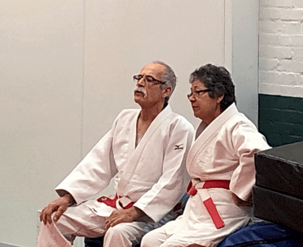 Eric Joseph and Janet Johnson reviewing candidates at a Niagara Judo Yudanshakai Promotion clinic.