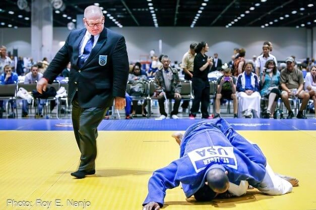 Roy in action as a referee